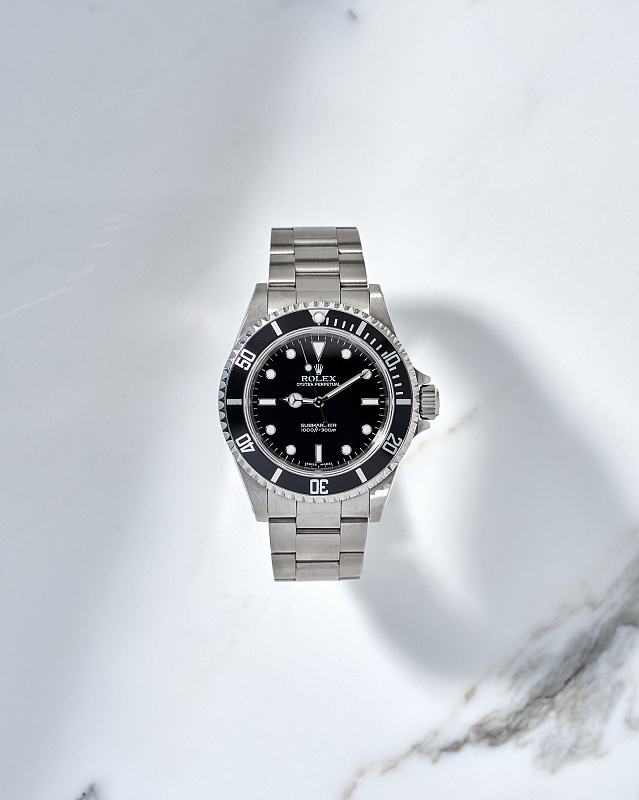 Rolex Submariner 40mm with papers 2007 year