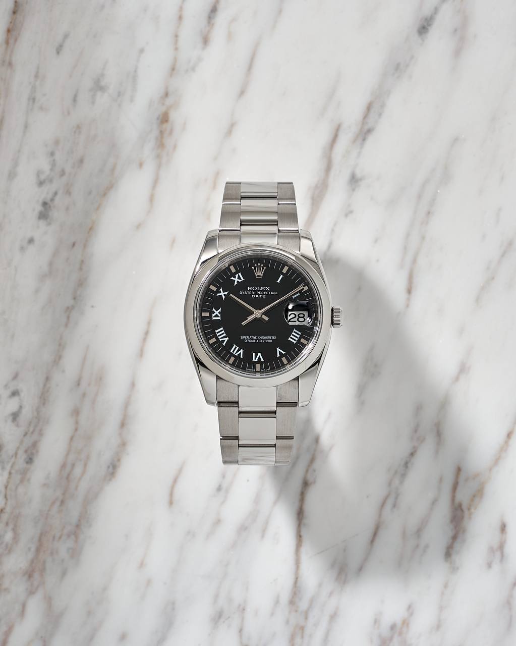Rolex Oyster Perpetual Date Black Romain Dial 34mm G Series 115200